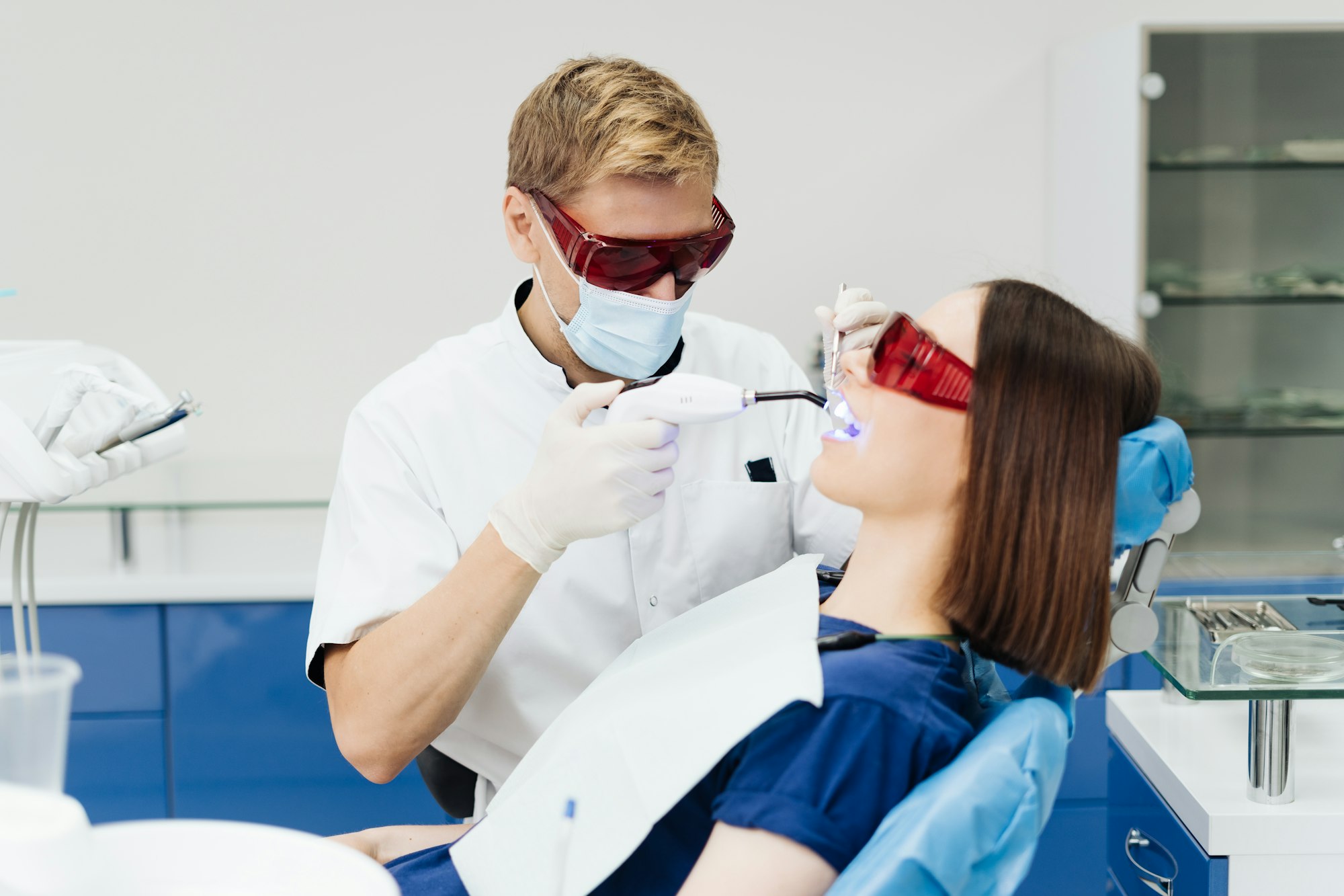Young woman getting dental treatment